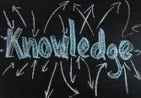 knowledge written in blue on black board